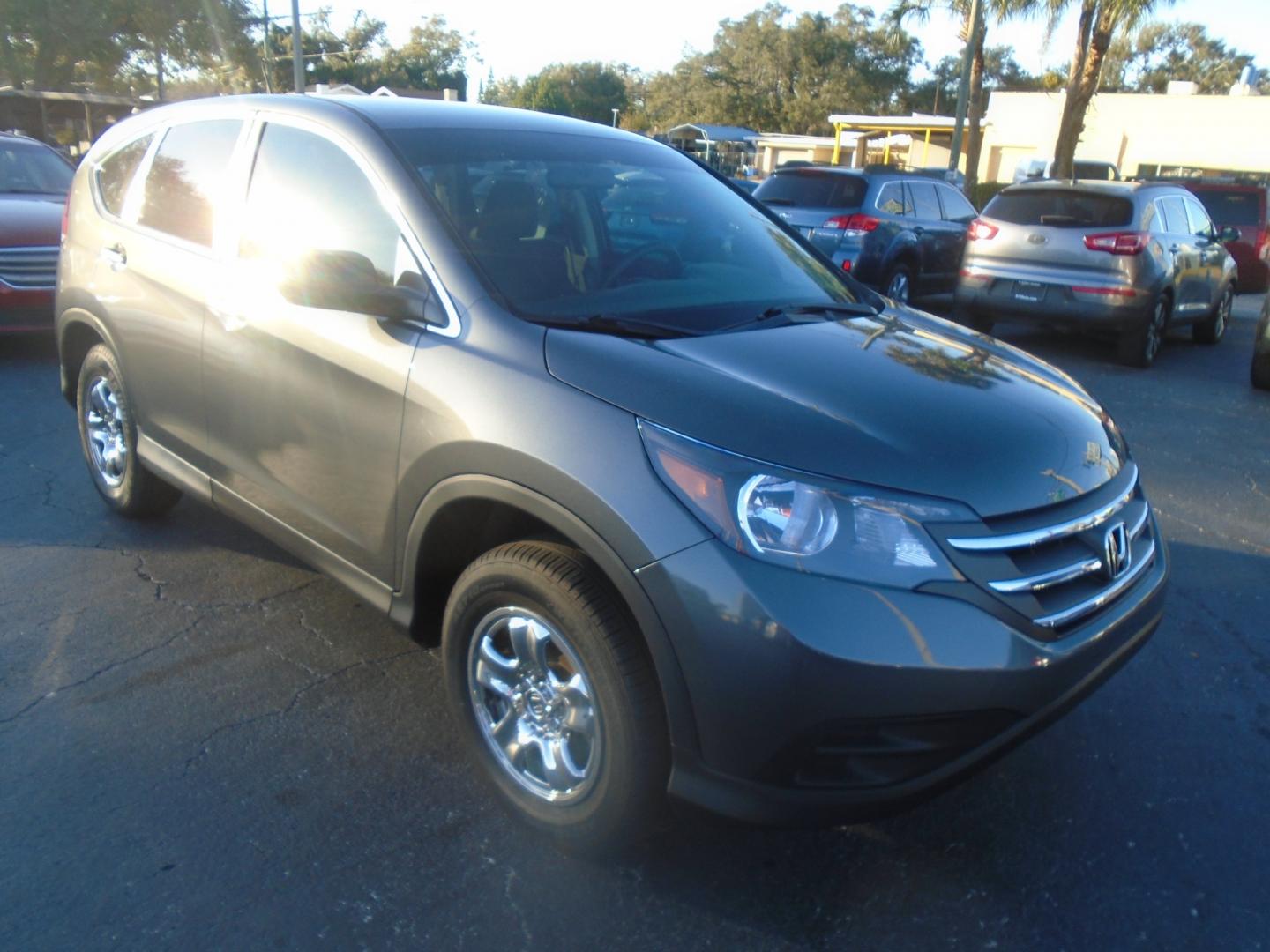 2012 GREY /Grey Honda CR-V LX 2WD 5-Speed AT (5J6RM3H31CL) with an 2.4L L4 DOHC 16V engine, 5-Speed Automatic transmission, located at 6112 N Florida Avenue, Tampa, FL, 33604, (888) 521-5131, 27.954929, -82.459534 - Photo#2